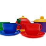 Set of children kitchen ware from cups, teapot and pan